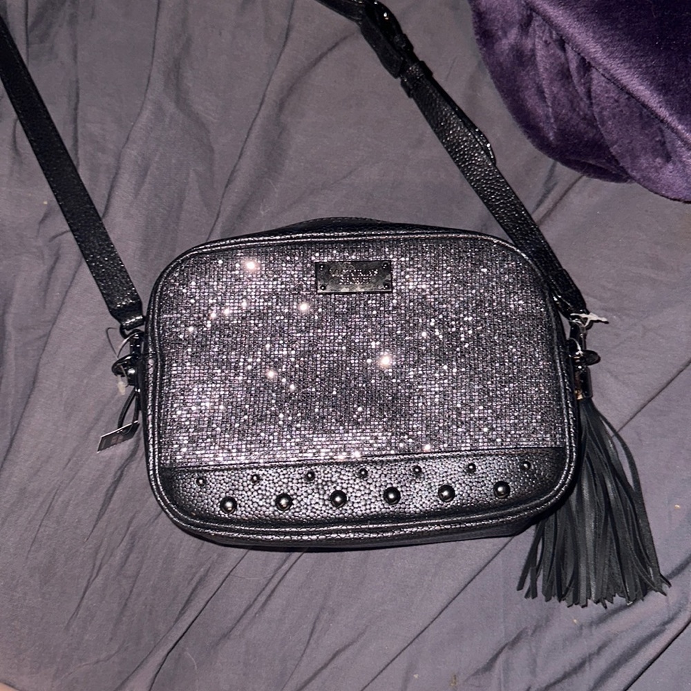 Victoria's Secret Black and shiny silver on the front !